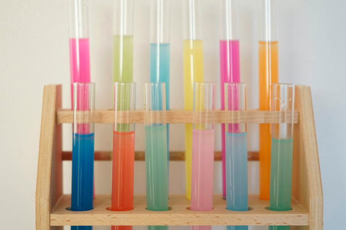 A rack of coloured test tubes